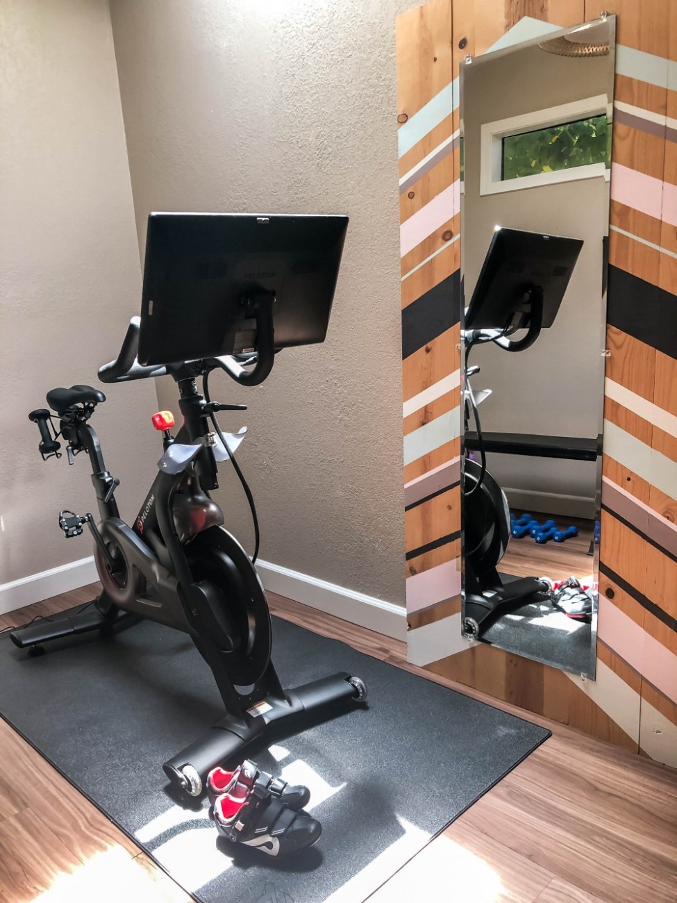 Sharing an honest review of my Peloton bike as well as my mini at-home gym reveal! You don't need a ton of space in your home to have a dedicated workout area and I'm going to prove it to you! Click on over to the post to check it out! #pelotonbike #pelotonbikereview #athomegym #athomeworkouts #bbg