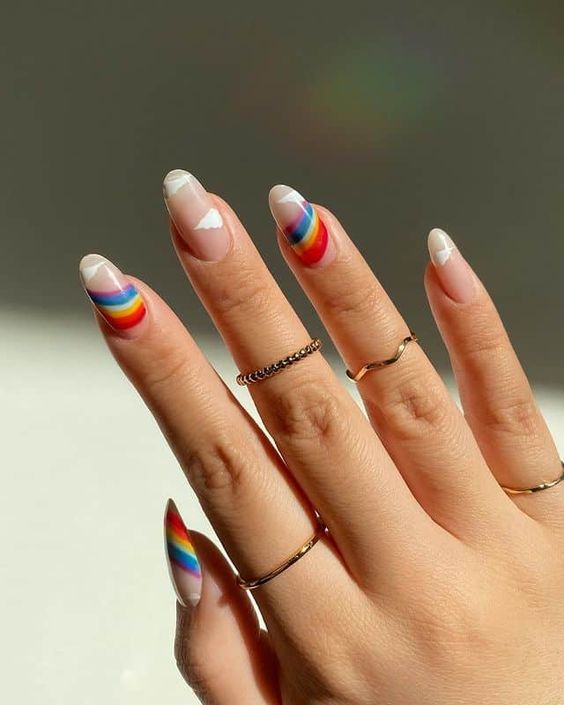 Rainbow and cloud nail art