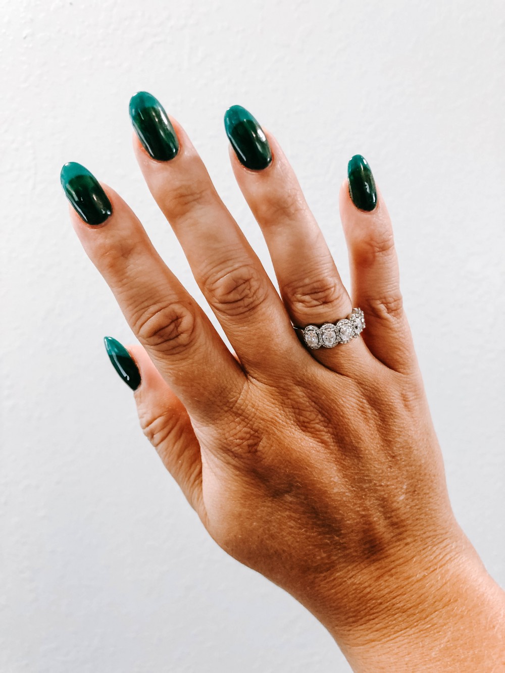 Two tone jewel tone nails. Green gel manicure. Nail art inspiration for Fall and Winter.
