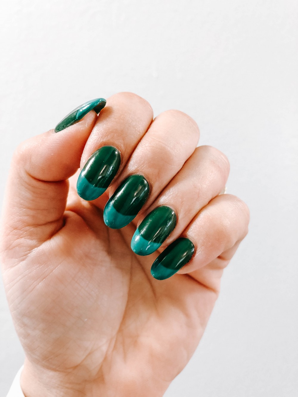Two tone jewel tone nails. Green gel manicure. Nail art inspiration for Fall and Winter.