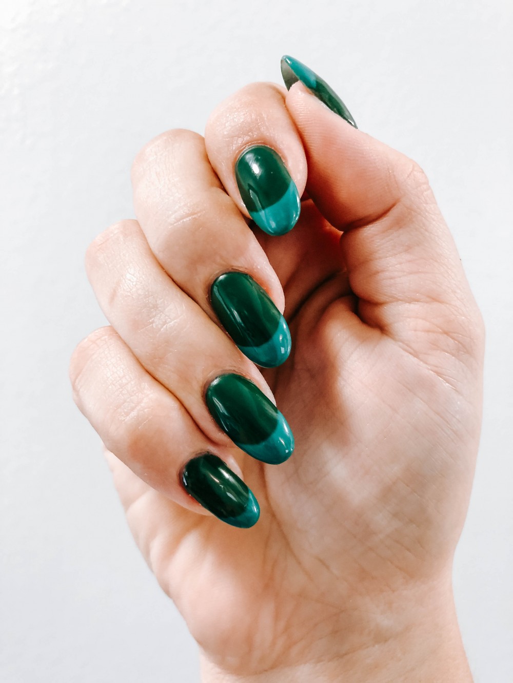 Two tone jewel tone nails. Green gel manicure. Nail art inspiration for Fall and Winter.